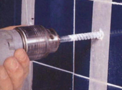 Drilling tiles on the wall