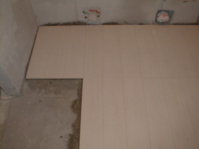 The best base for gluing seamless tiles is concrete screed
