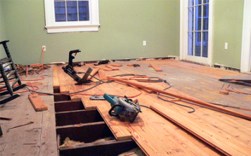 Replacing rotten wooden floorboards