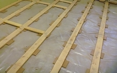 Logs for leveling the floor with plywood