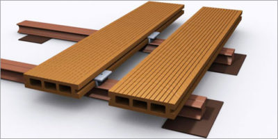 Les planches de terrasse sont facilement fixées aux bûches avec des clips métalliques