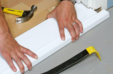 The threshold should fit snugly into the grooves on the door frames.