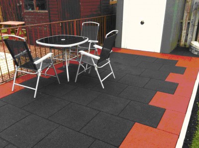 Rubber tiles can become a floor decoration of a terrace or balcony