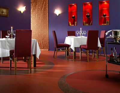 Commercial linoleum is often used for flooring in restaurants and cafes.