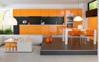 The dining area of ​​the kitchen is raised on the podium, so it is perceived as a separate part of the room
