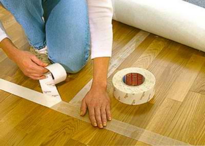 Colocación de alfombras en cinta