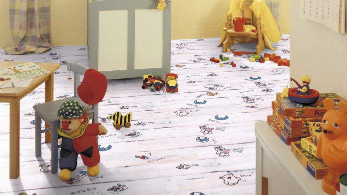 Laminate with a child's drawing in the room for the child