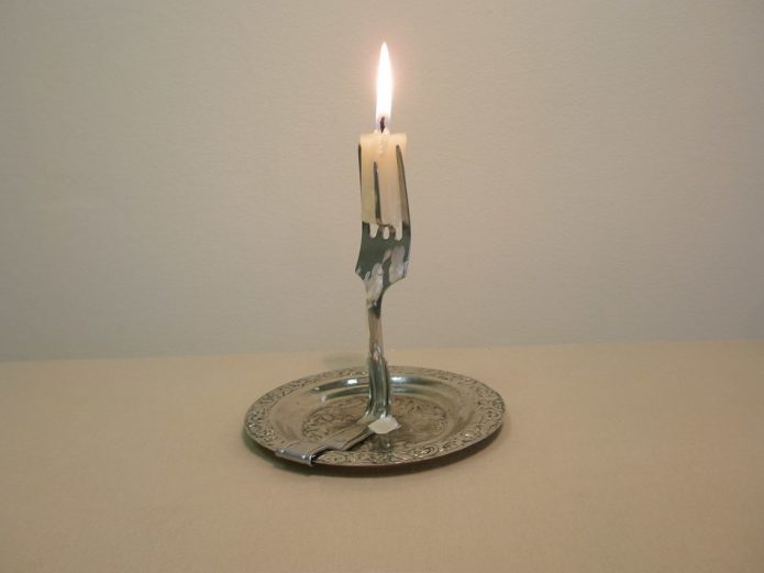 Įspūdinga kištuko žvakidė