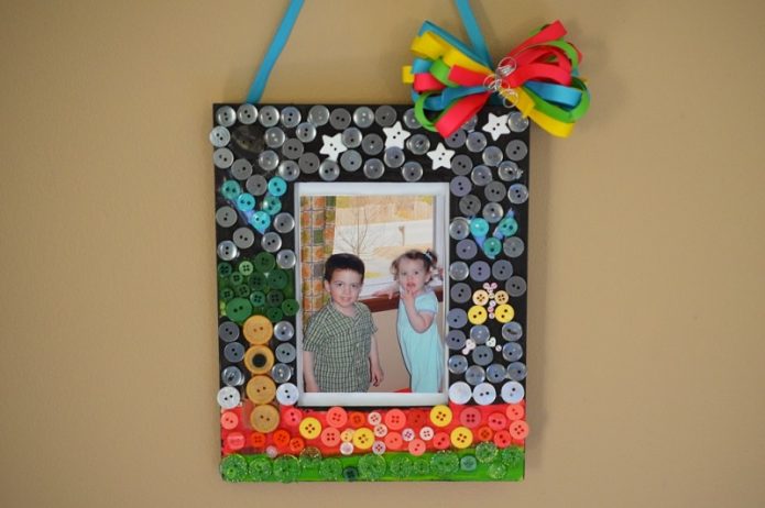 Photo frame decorated with colored buttons