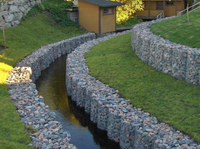 The shore of the creek of gabions
