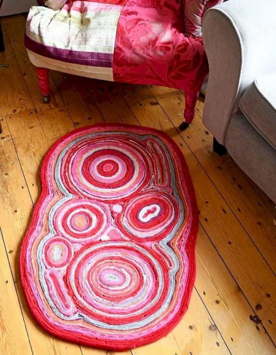 Rug from stripes of old knitwear