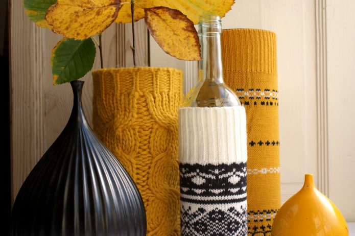 Homemade vases in cases from old sweaters